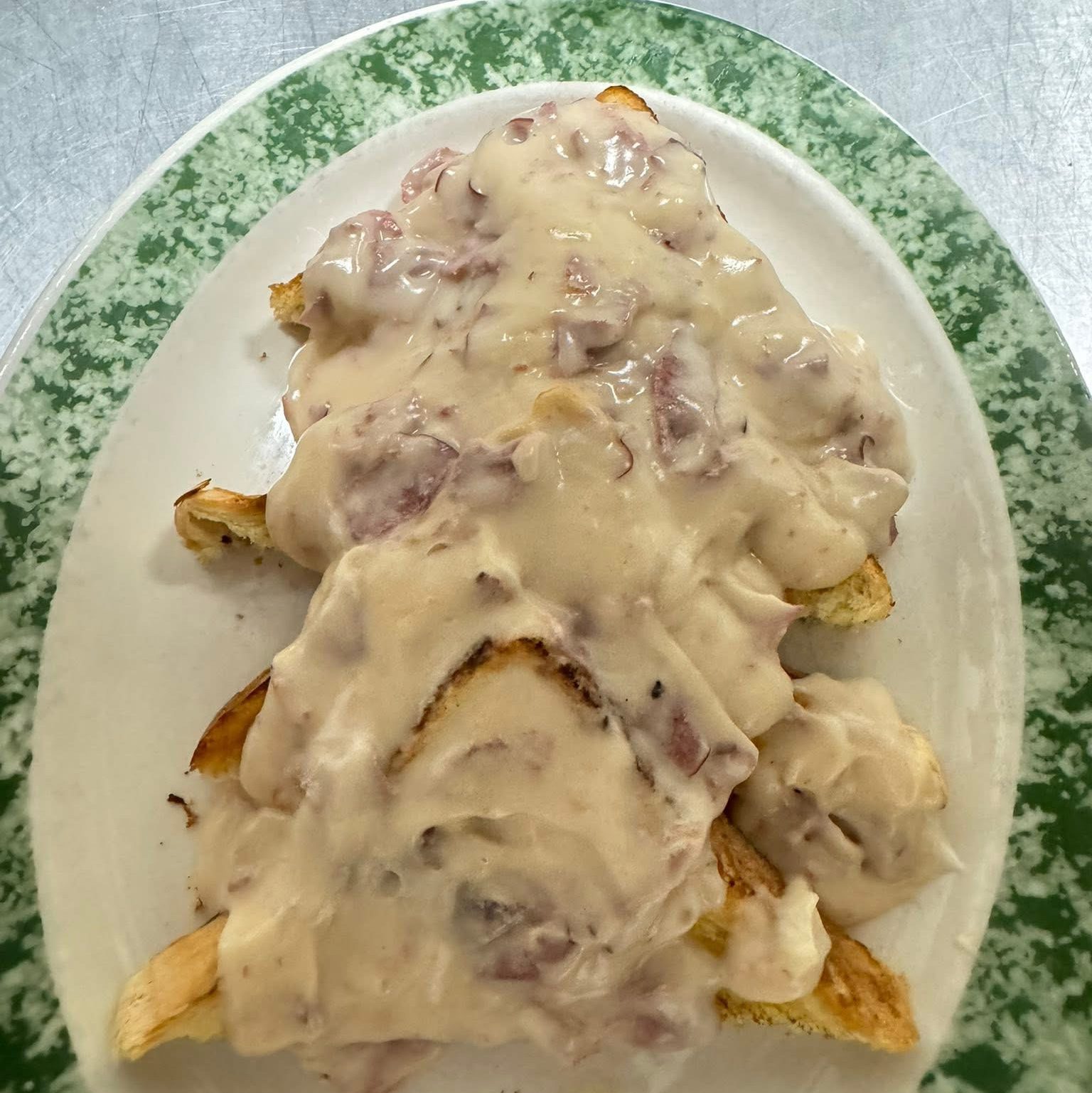 Cream Chipped Beef on White Toast Breakfast.